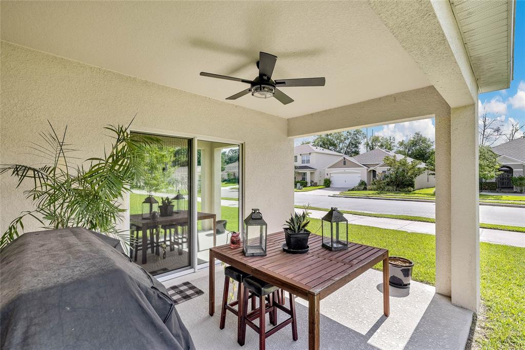 115 Duchess Road DeLand, FL 32724 - Photo 29 of 37 a view of a dining room with furniture window and outside view