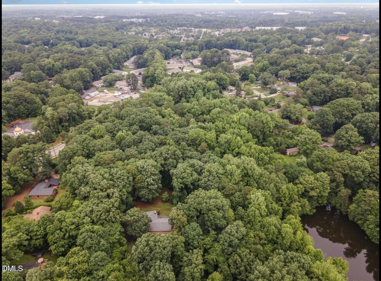 517 Buck Jones Road Raleigh, NC 27606 - Photo 6 of 6 an aerial view of house with yard and mountain view in back