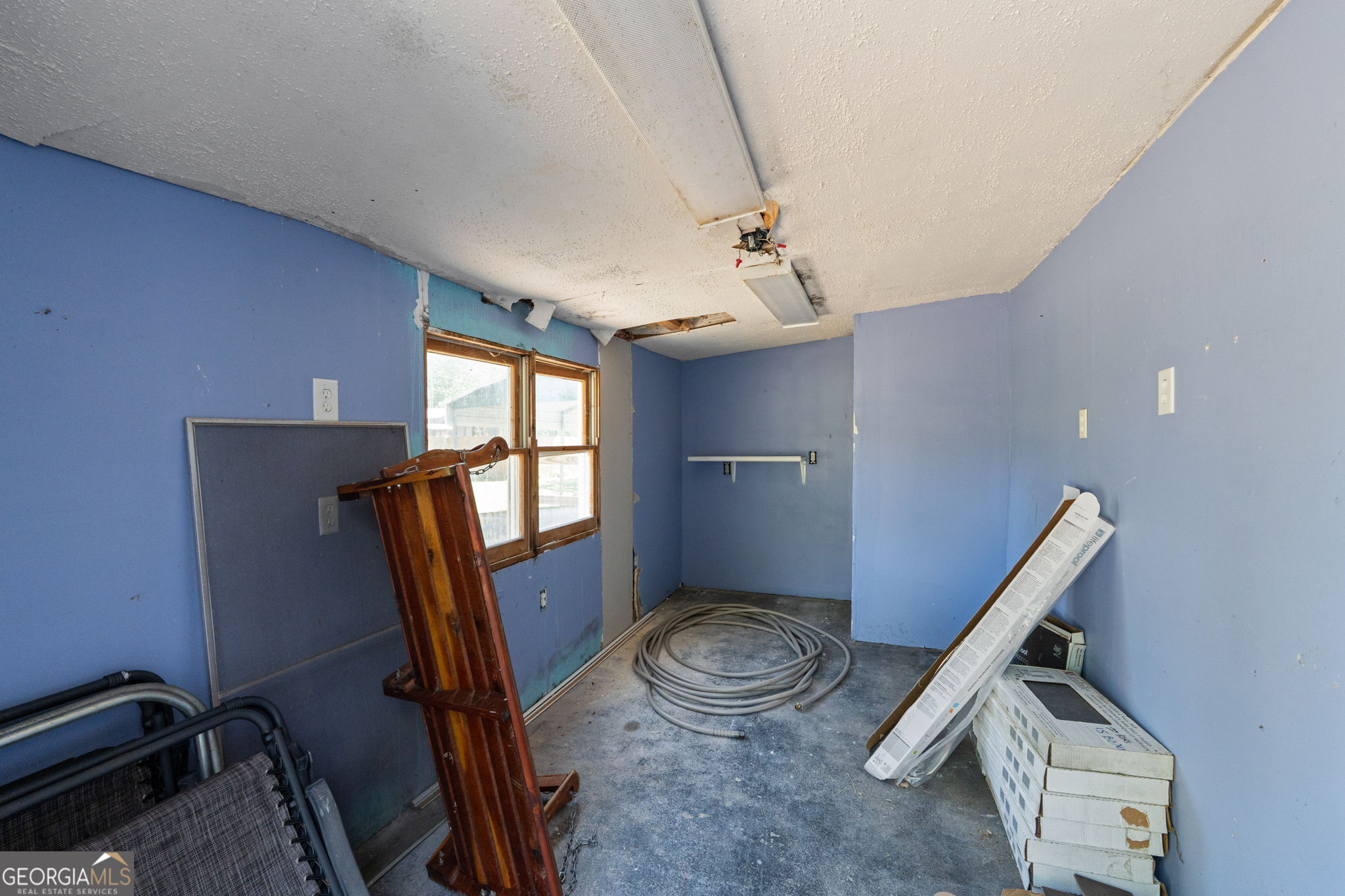 49 Frost Road Bowdon, GA 30108 - Photo 35 of 60 a view of a room with gym equipment