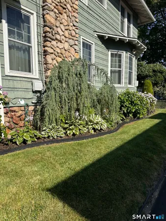 a view of a house with a garden