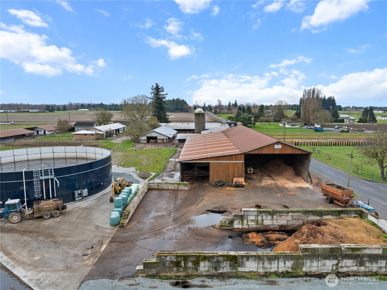 21563-21567 Cook Road Sedro-Woolley, WA 98284 - Photo 33 of 38 a view of a house with pool and chairs