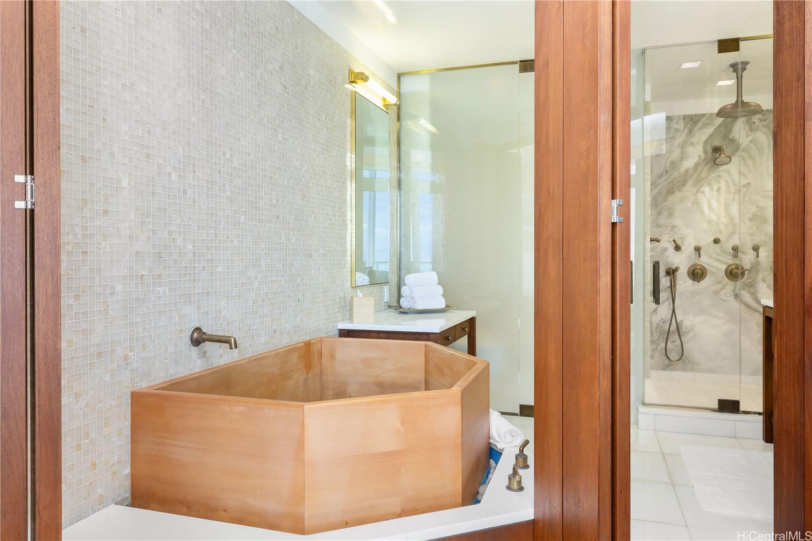 223 Saratoga Road, Unit PHD Honolulu, HI 96815 - Photo 15 of 25 a bathroom with a tub and shower