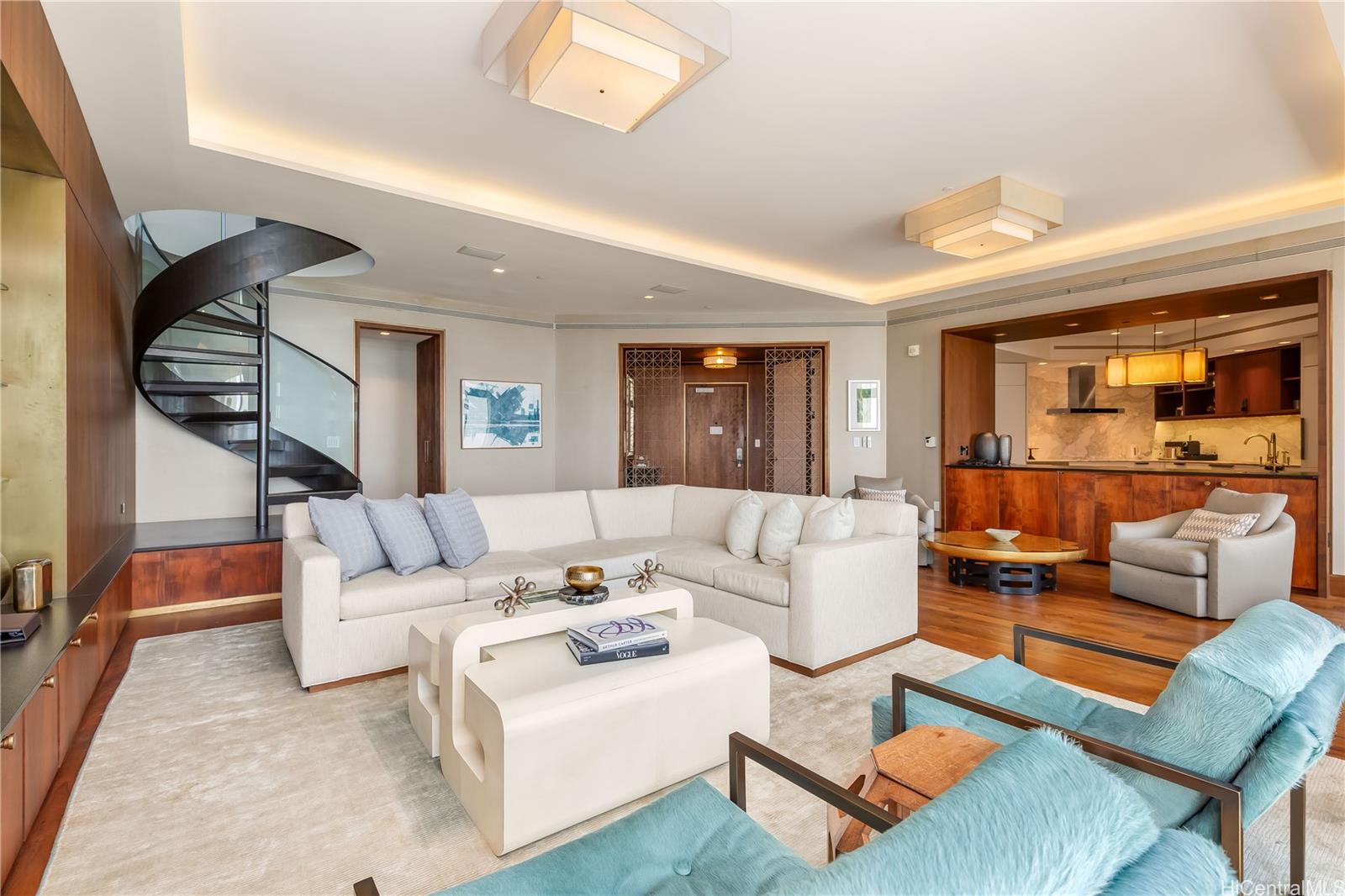 223 Saratoga Road, Unit PHD Honolulu, HI 96815 - Photo 7 of 25 a living room with furniture and a large window