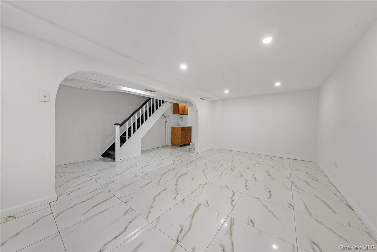 4309 Edson Avenue Bronx, NY 10466 - Photo 15 of 26 a view of an empty room with stairs