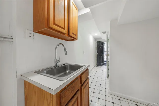 a view of an empty room with stairs