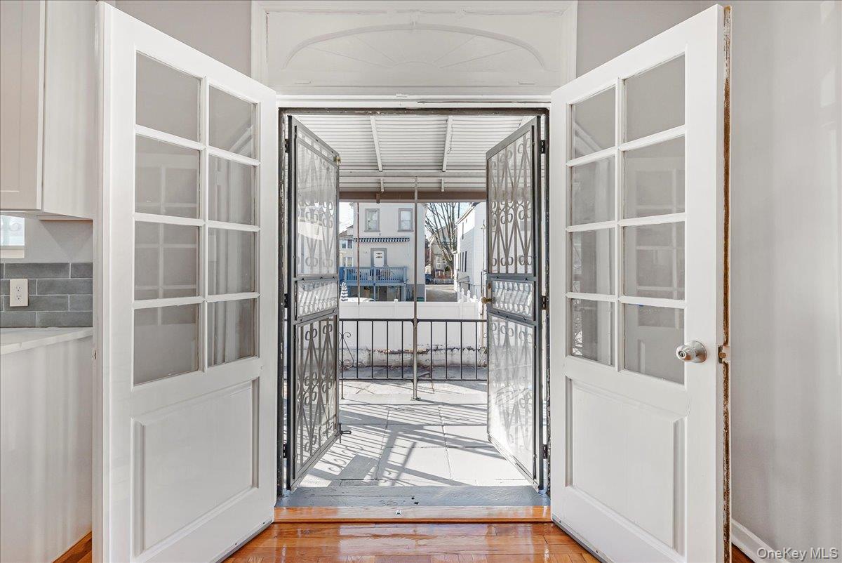 4309 Edson Avenue Bronx, NY 10466 - Photo 19 of 26 a view of staircase with white walls and front door