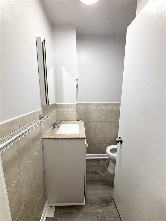 98 Main Street, Unit 1 Malden, MA 02148 - Photo 14 of 15 a utility room with dryer and washer