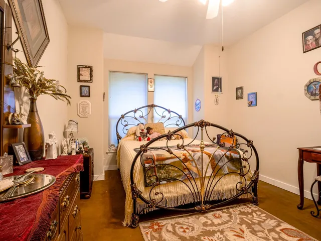 a bathroom with a sink mirror toilet and shower