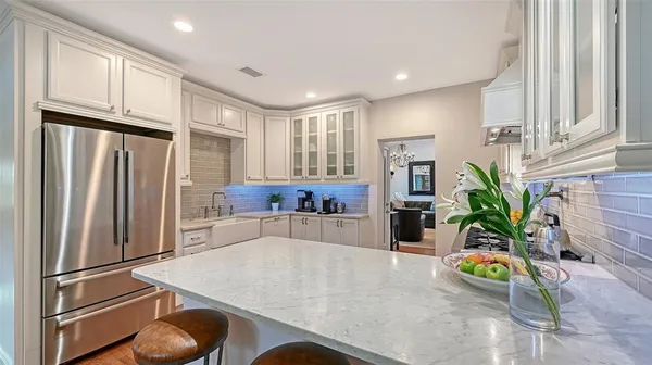 a kitchen with a sink and cabinets