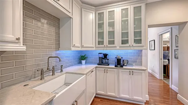 a kitchen with a stove and a refrigerator