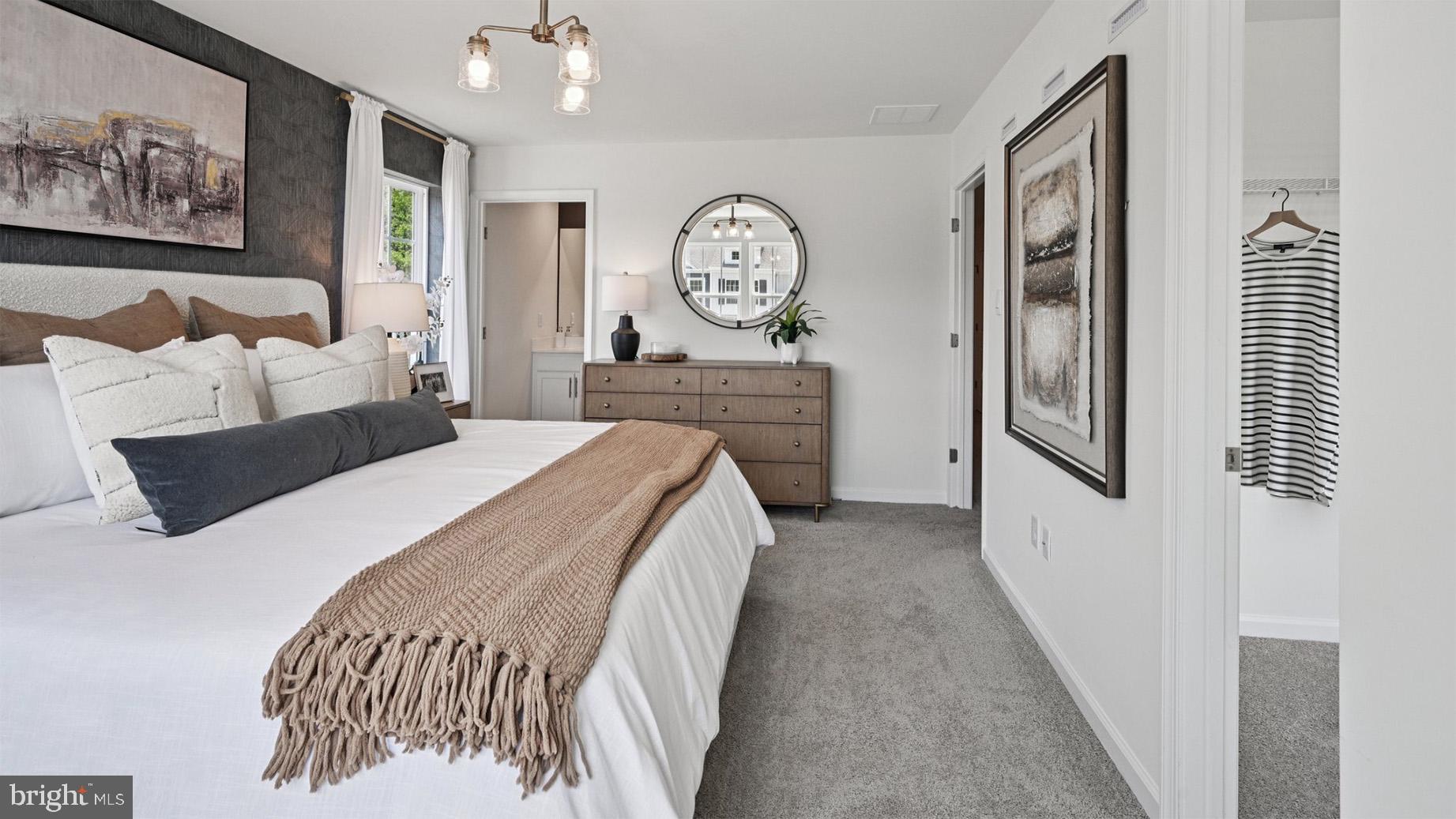 59 Robert Drive Runnemede, NJ 08078 - Photo 23 of 48 a bedroom with bed and a chandelier