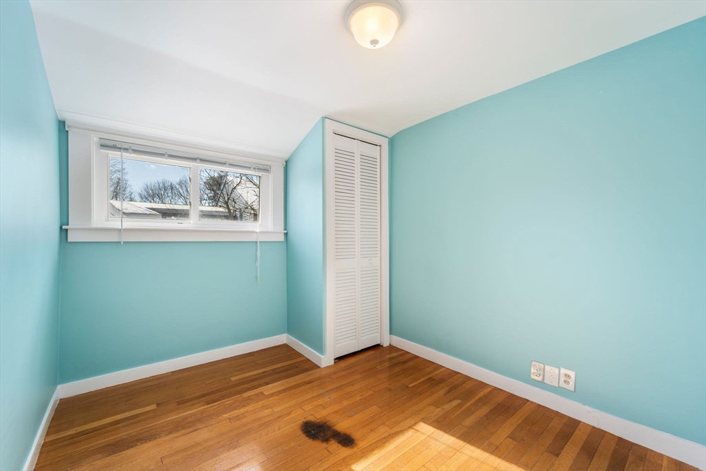 278 North Main Street Natick, MA 01760 - Photo 15 of 28 a bedroom with a bed and a window