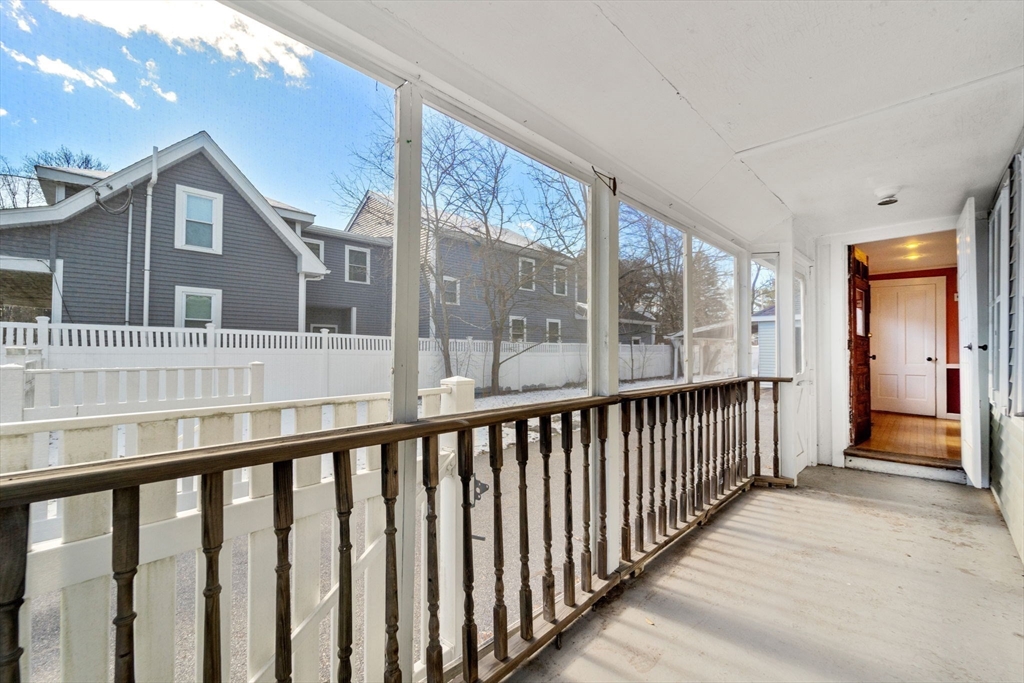 278 North Main Street Natick, MA 01760 - Photo 19 of 28 a view of a brick house with a porch