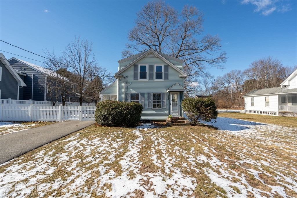 278 North Main Street Natick, MA 01760 - Photo 2 of 28 a front view of a house with a yard