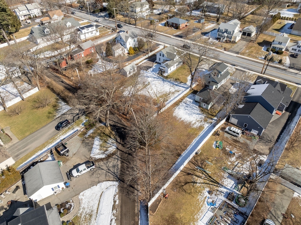 278 North Main Street Natick, MA 01760 - Photo 22 of 28 an aerial view of a house with a yard