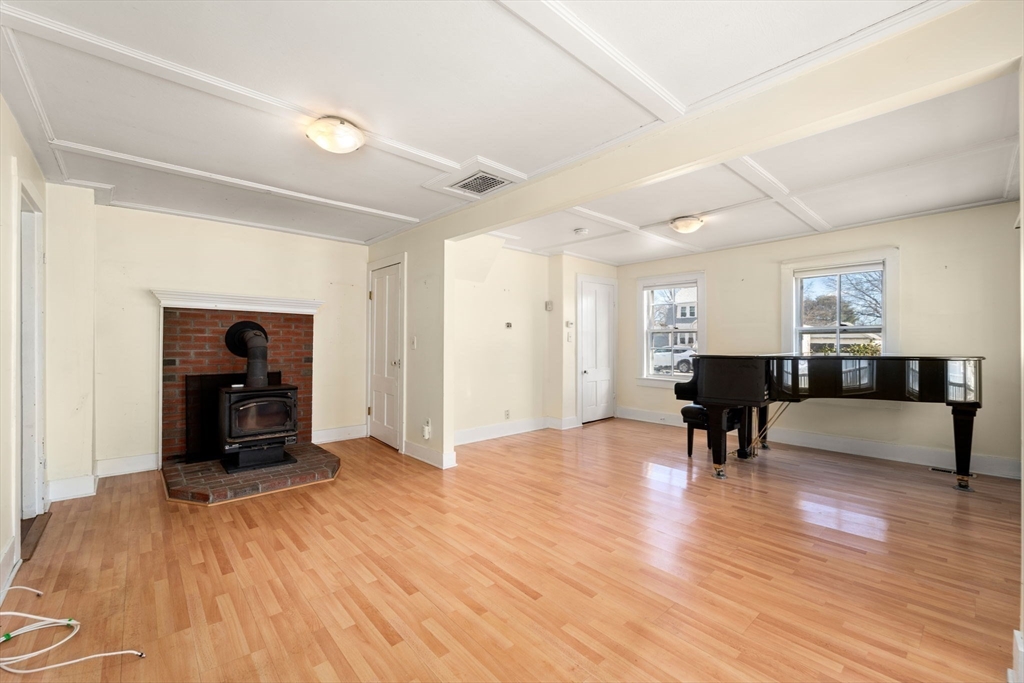 278 North Main Street Natick, MA 01760 - Photo 10 of 28 a view of livingroom with furniture and wooden floor