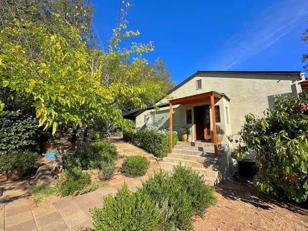 a view of street from balcony