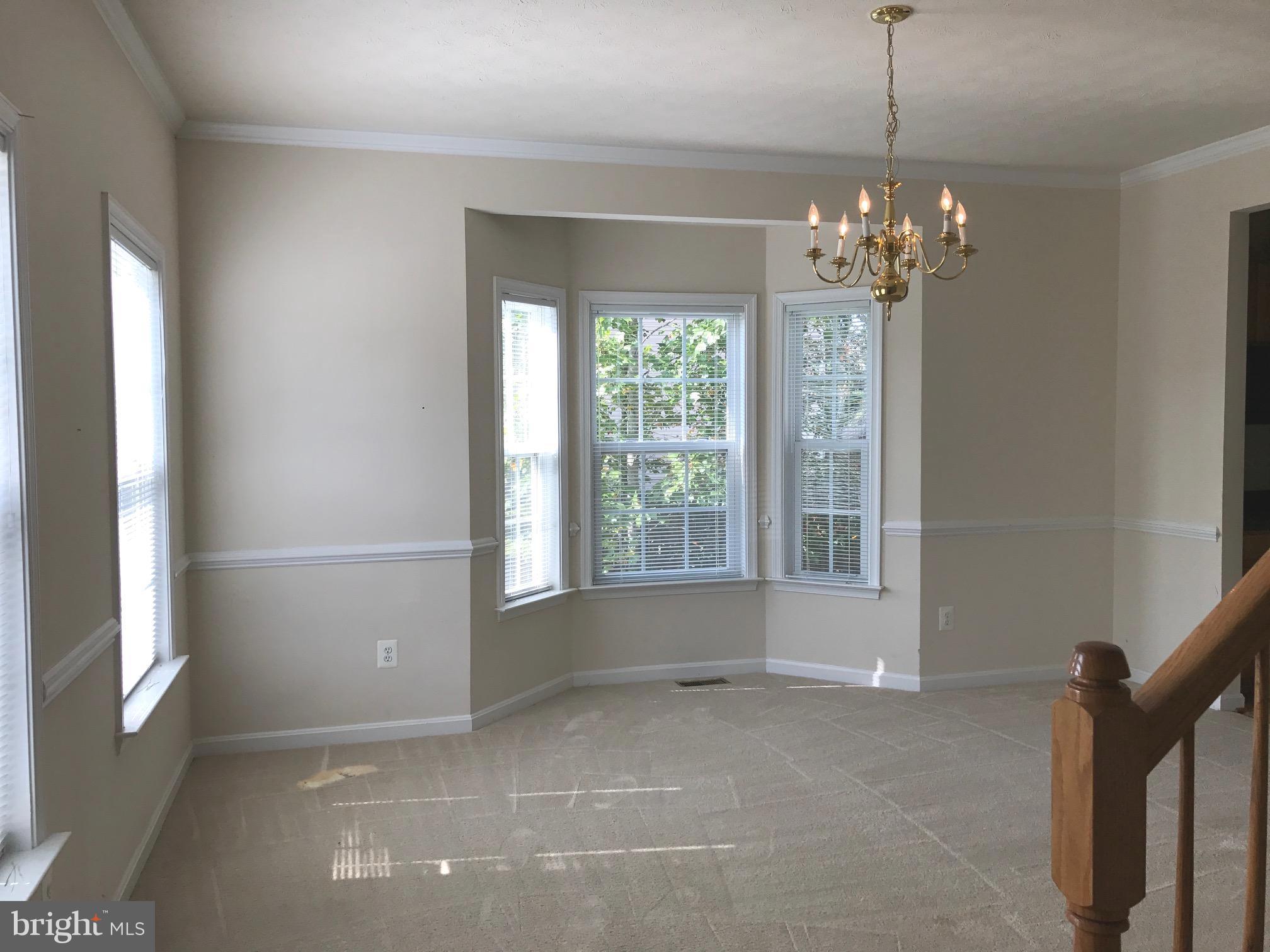 35311 Pheasant Ridge Road Locust Grove, VA 22508 - Photo 5 of 20 Chair railing and bay windows inDining Room