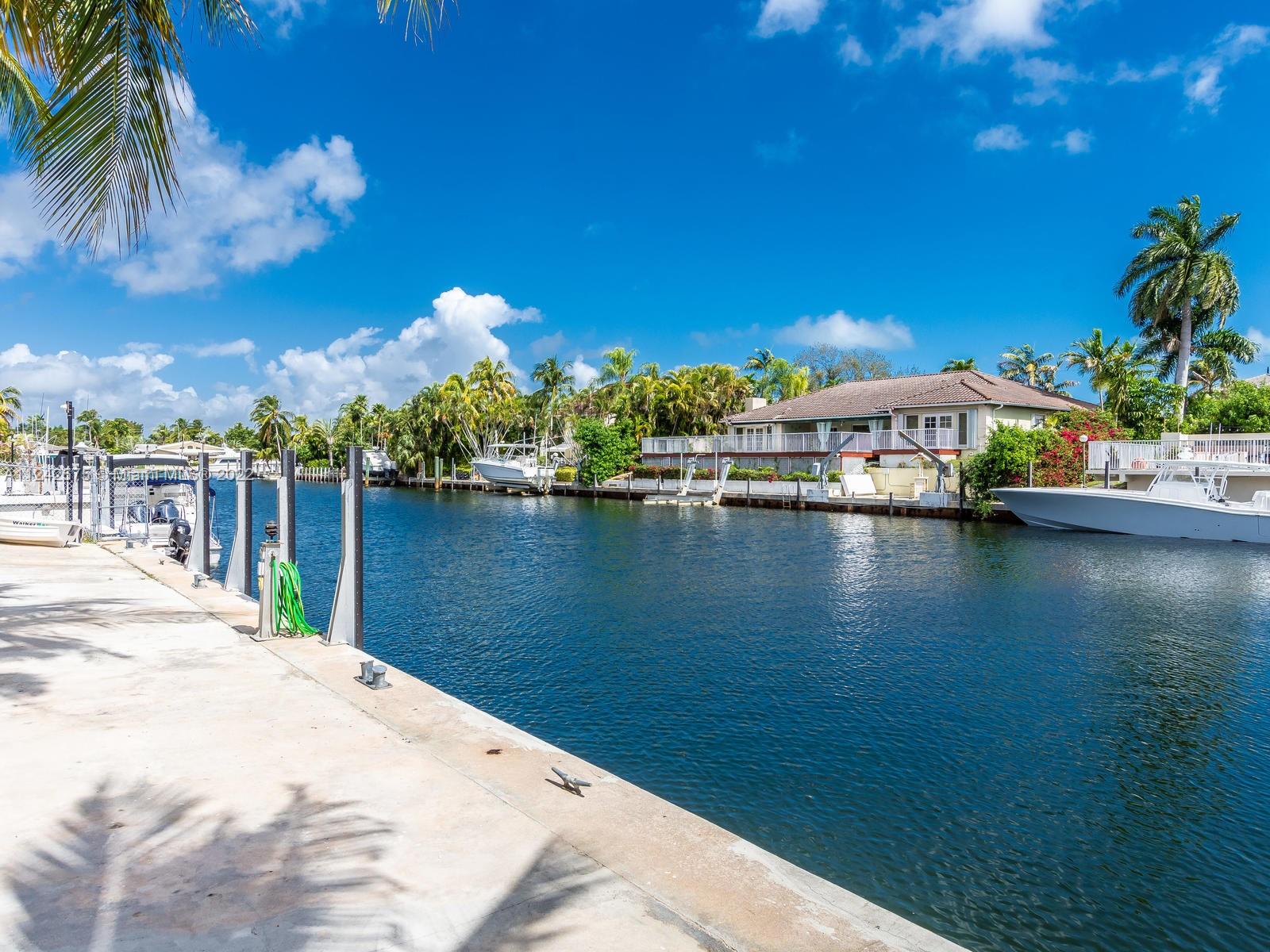 a view of a lake with a house
