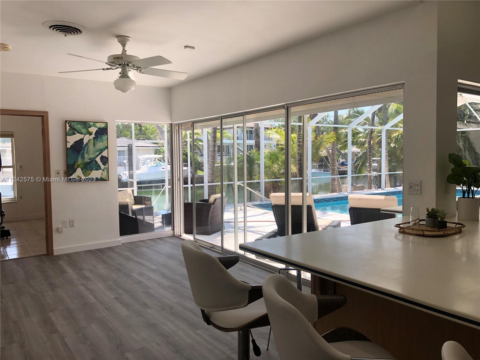 13001 Deva Street Coral Gables, FL 33156 - Photo 25 of 99 a view of a dining room with furniture window and outside view