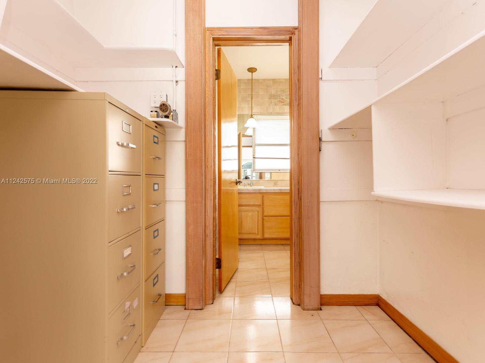 13001 Deva Street Coral Gables, FL 33156 - Photo 56 of 99 a bathroom with a shower and a glass door