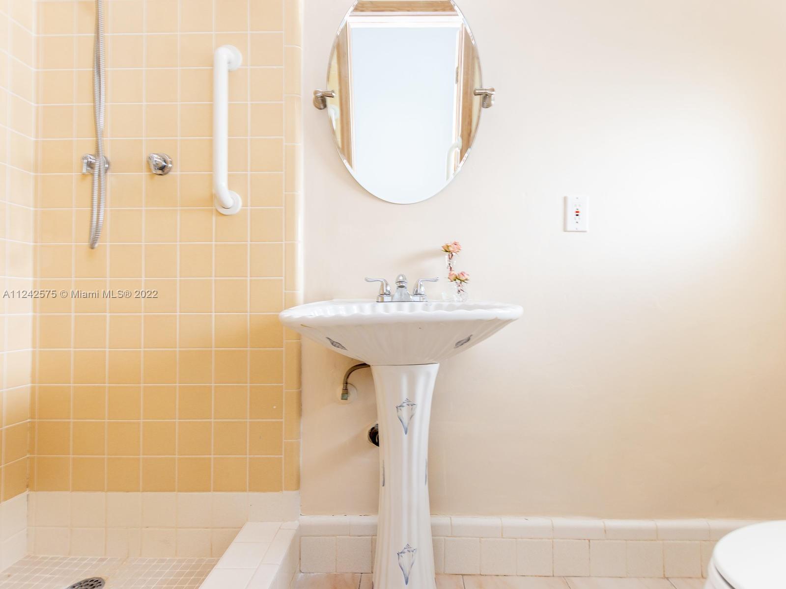 13001 Deva Street Coral Gables, FL 33156 - Photo 60 of 99 a bathroom with a sink a toilet and shower