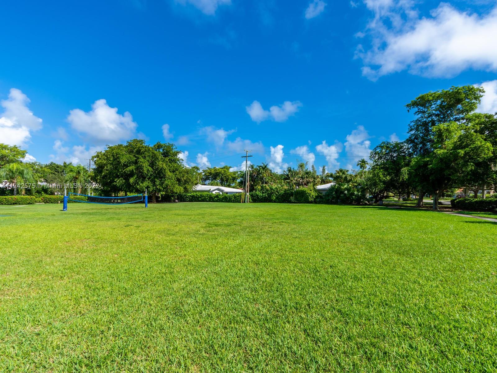 13001 Deva Street Coral Gables, FL 33156 - Photo 93 of 99 a view of a field of grass and trees