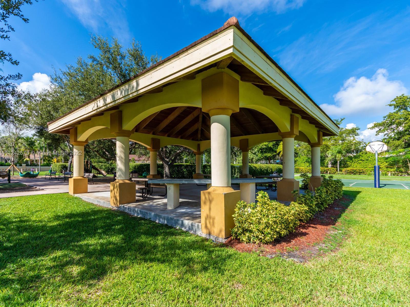 13001 Deva Street Coral Gables, FL 33156 - Photo 96 of 99 a view of a chair and table of the house