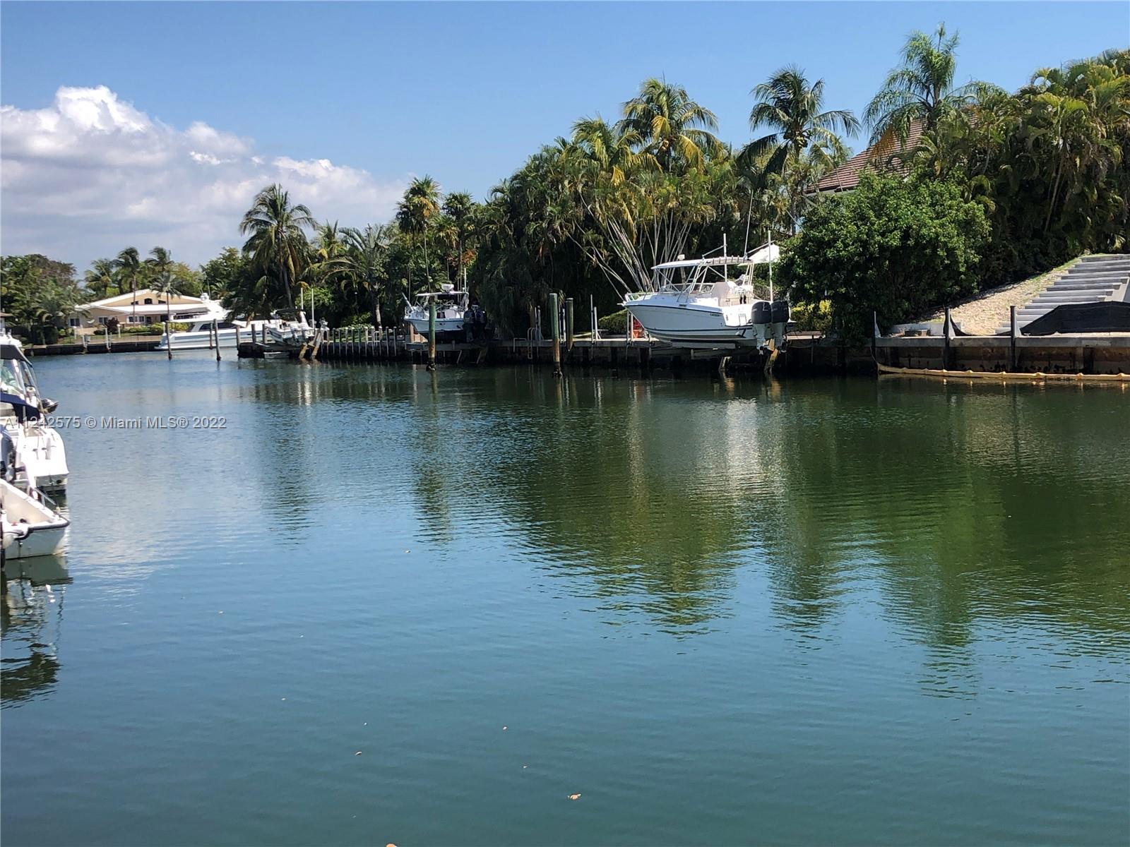 13001 Deva Street Coral Gables, FL 33156 - Photo 99 of 99 a view of a lake with houses