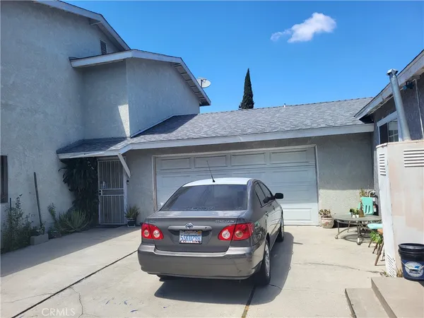 a car parked in front of a house