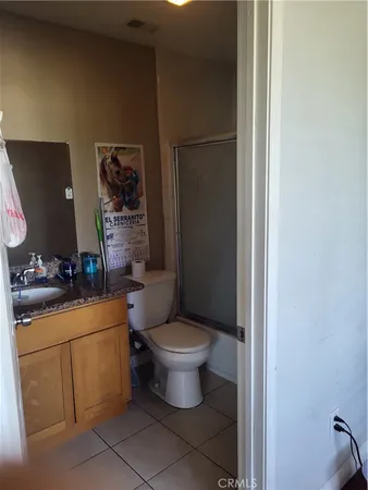 a bathroom with a toilet and a sink