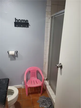 a bathroom with a sink and toilet