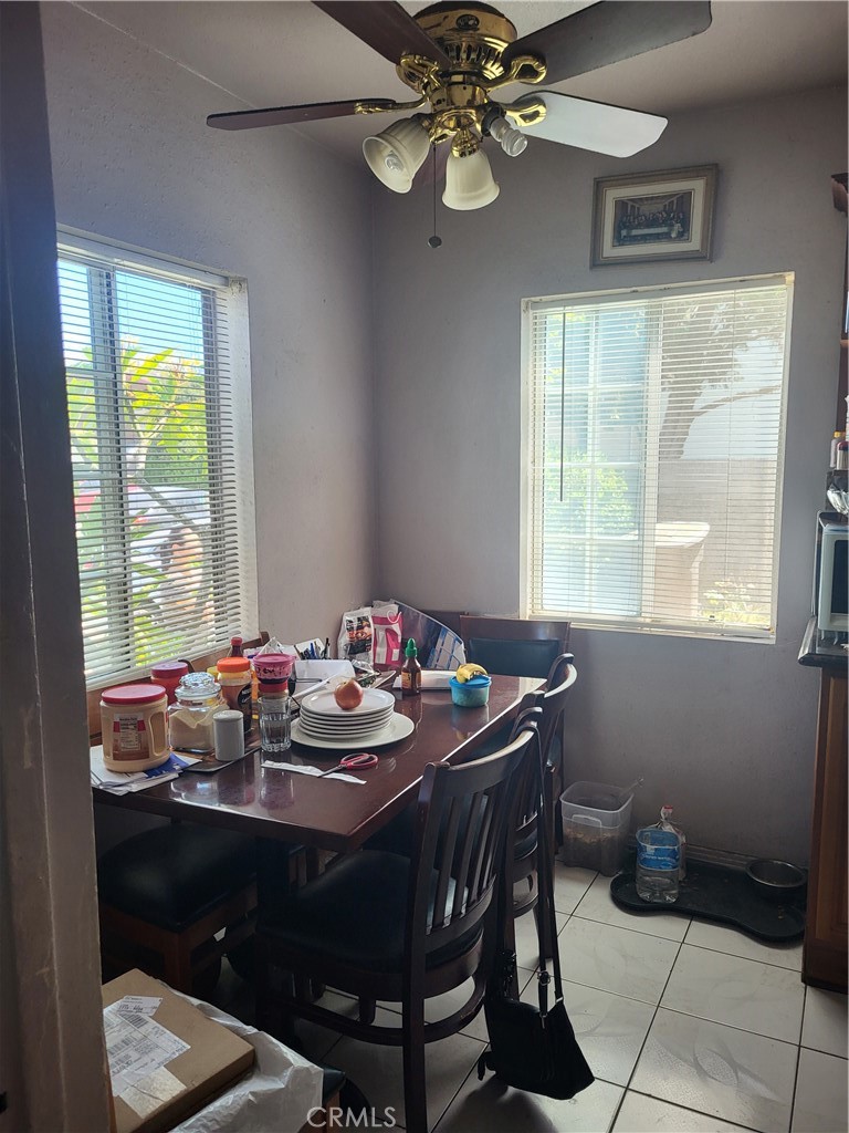 13141 Monroe Street Garden Grove, CA 92844 - Photo 8 of 21 a view of a dining room with a table and chairs