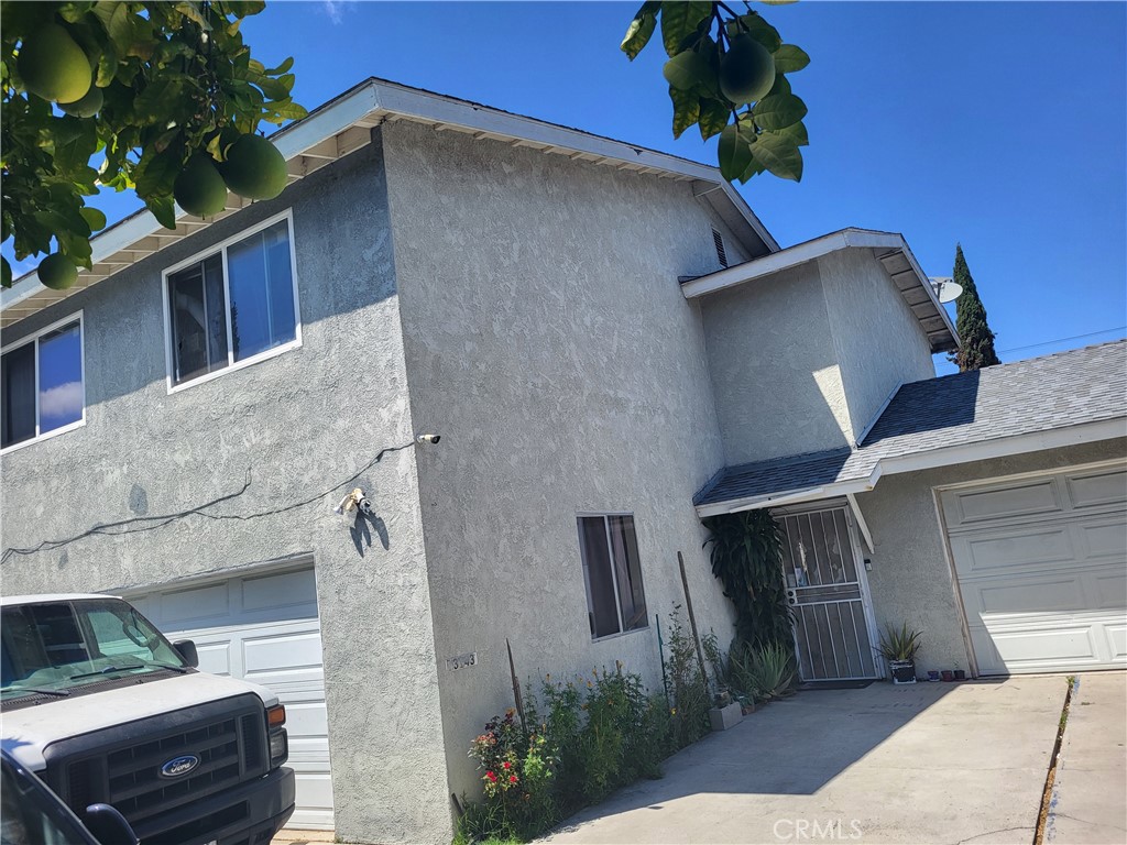 13141 Monroe Street Garden Grove, CA 92844 - Photo 10 of 21 a side view of a house with a garage