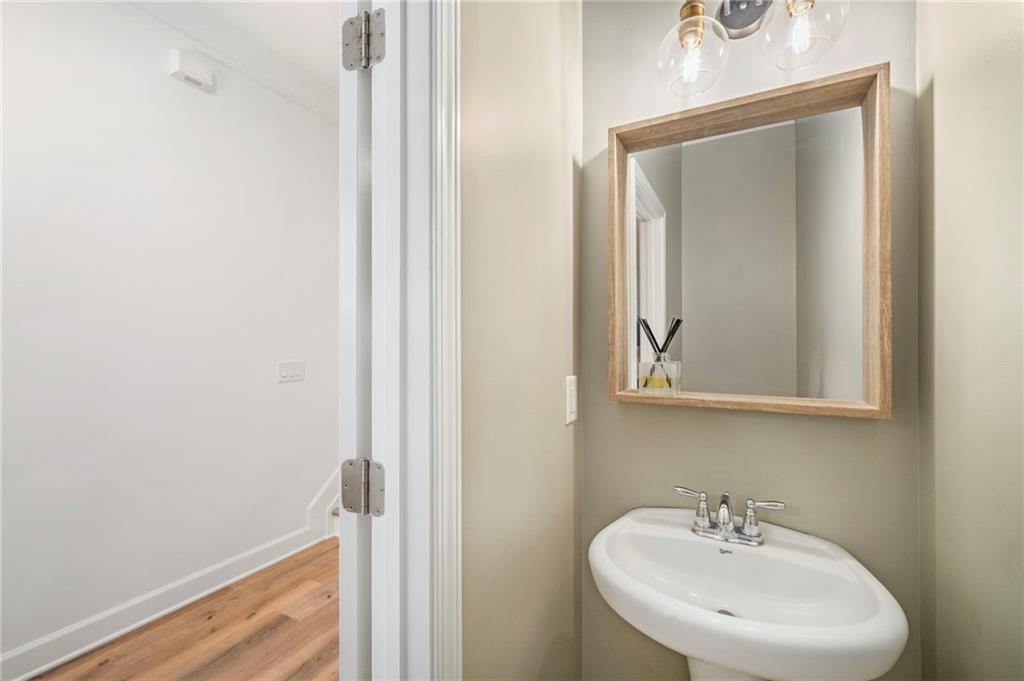 3628 Ashcroft Bend Atlanta, GA 30319 - Photo 21 of 44 a bathroom with a sink and a mirror