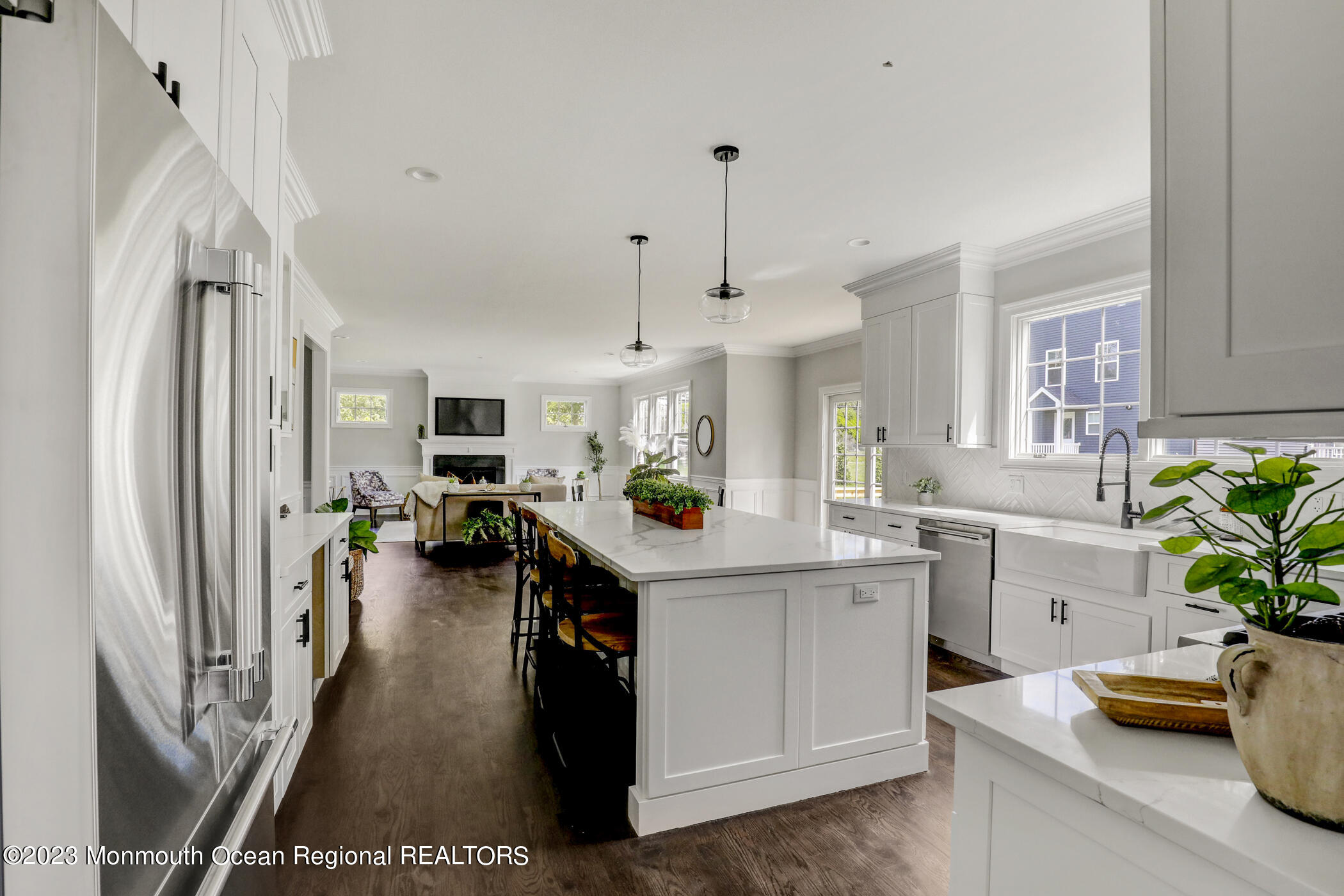 4 Southall Lane Red Bank, NJ 07701 - Photo 15 of 41 a kitchen that has a lot of cabinets a sink and wooden floor