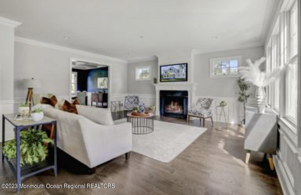 4 Southall Lane Red Bank, NJ 07701 - Photo 10 of 41 a living room with furniture and a fireplace