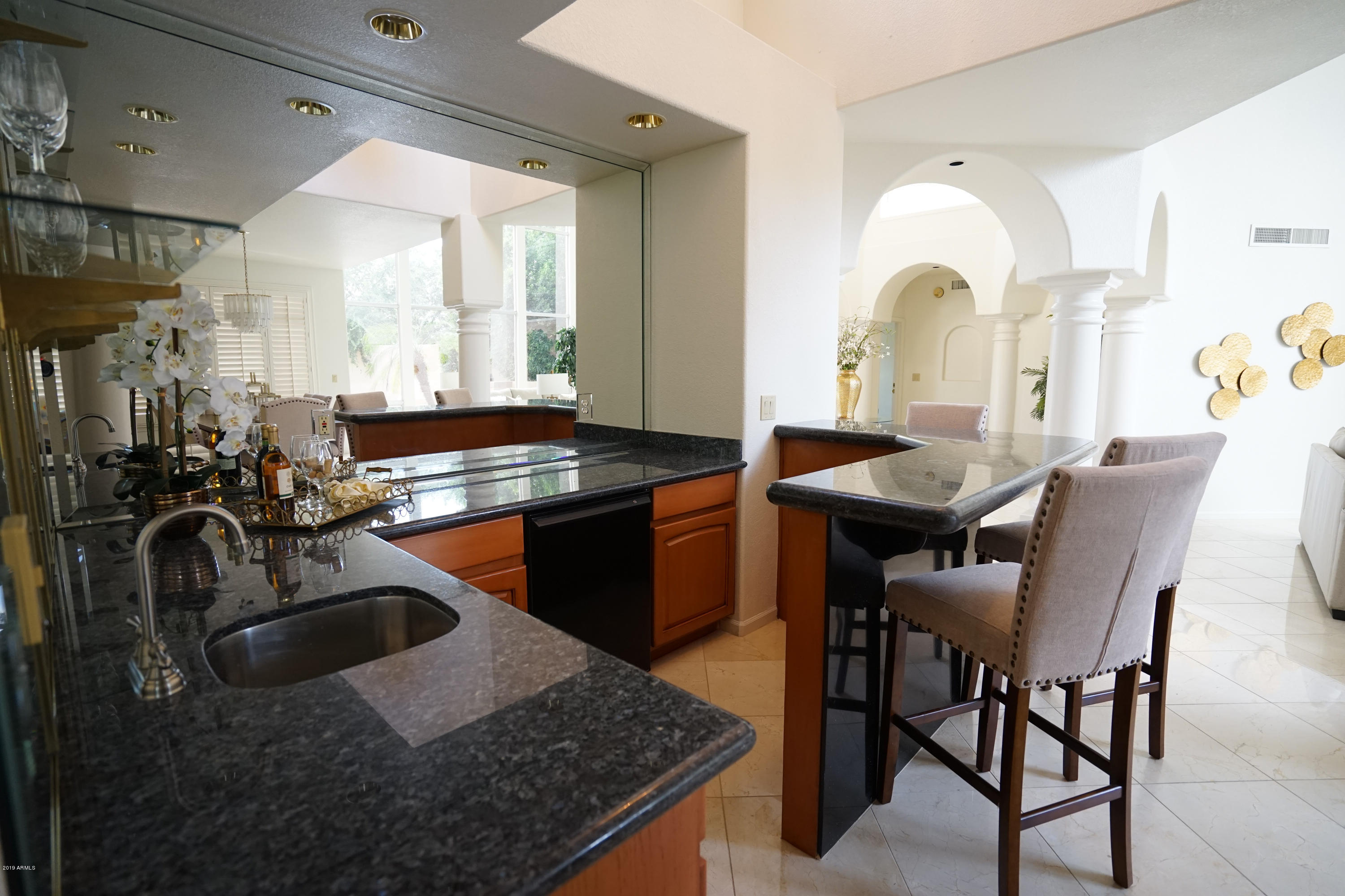 1225 East Warner Road, Unit 6 Tempe, AZ 85284 - Photo 11 of 86 a kitchen with a sink a stove and white cabinets