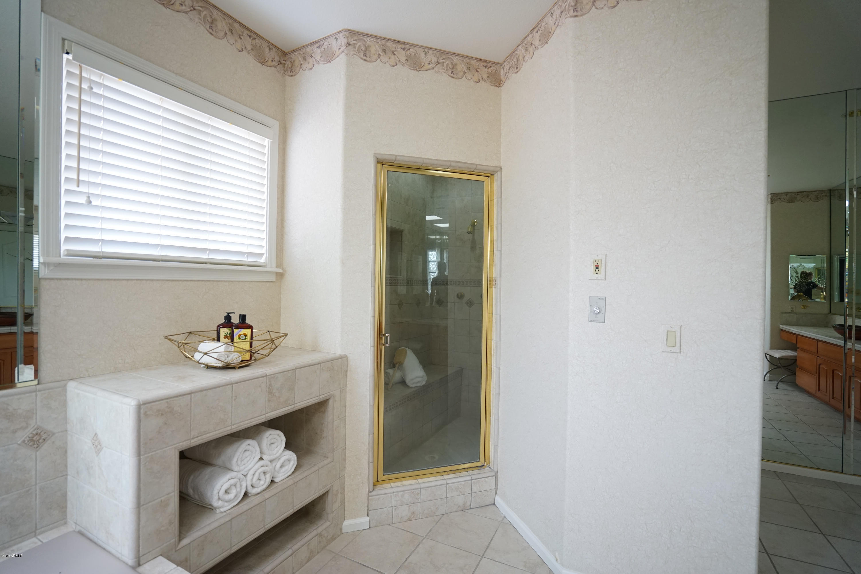 1225 East Warner Road, Unit 6 Tempe, AZ 85284 - Photo 30 of 86 a room with a fireplace and a window