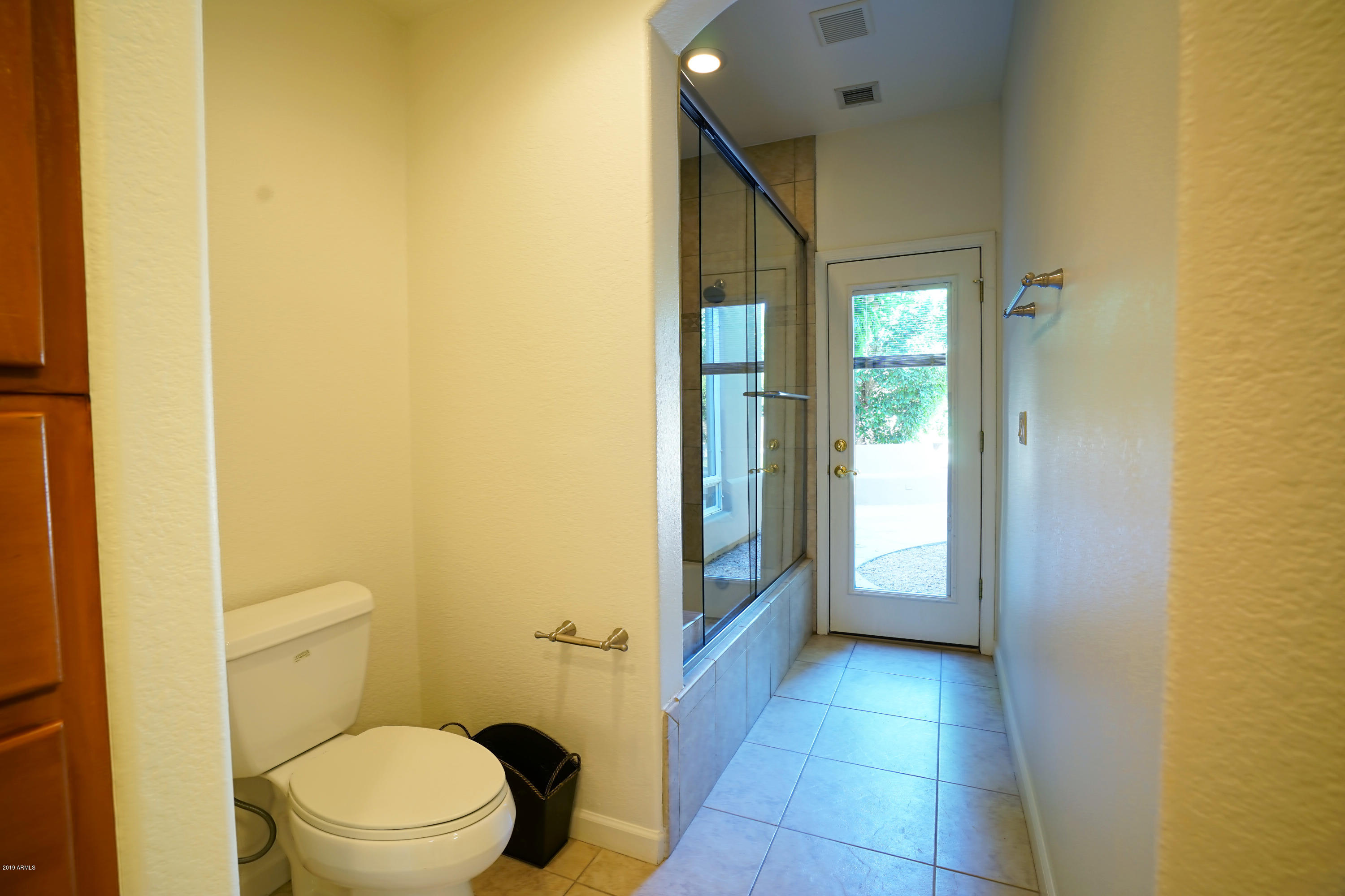 1225 East Warner Road, Unit 6 Tempe, AZ 85284 - Photo 47 of 86 a bathroom with a toilet and a shower