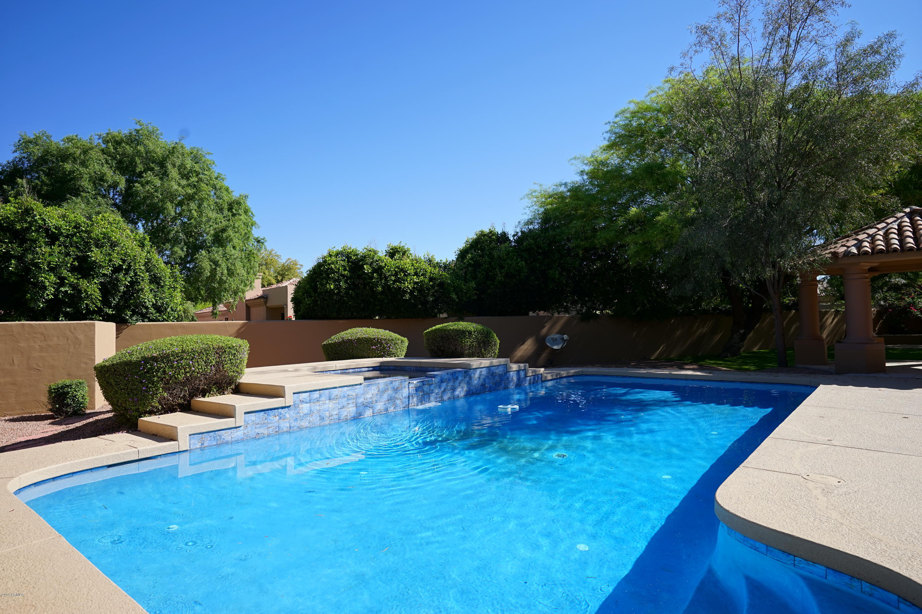1225 East Warner Road, Unit 6 Tempe, AZ 85284 - Photo 66 of 86 a view of a swimming pool with a patio