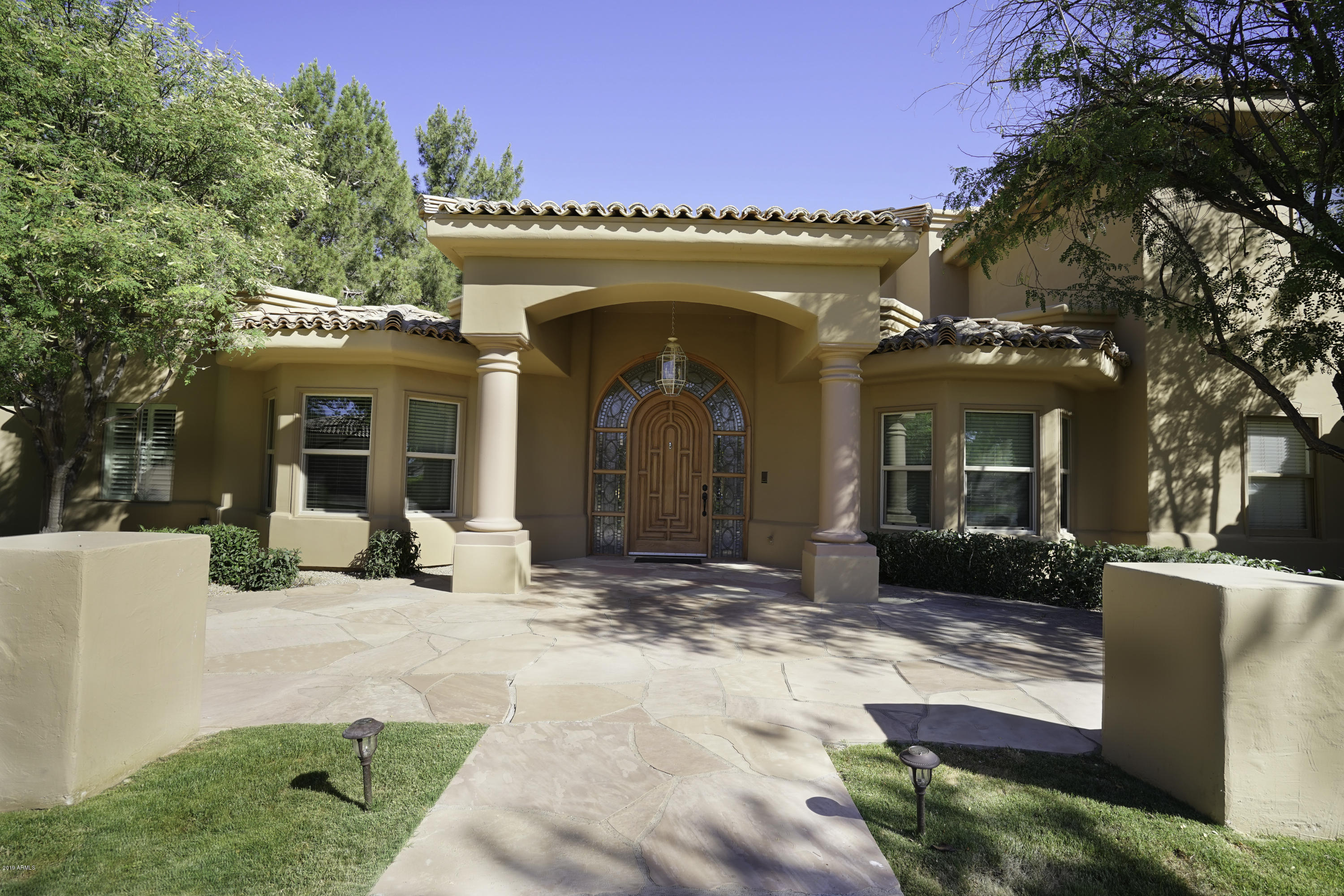 1225 East Warner Road, Unit 6 Tempe, AZ 85284 - Photo 75 of 86 a view of a house with a patio