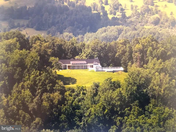 a view of a swimming pool with an ocean view