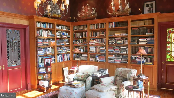 a living room with furniture a window and couch