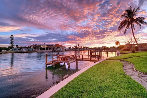 a view of a lake and a yard