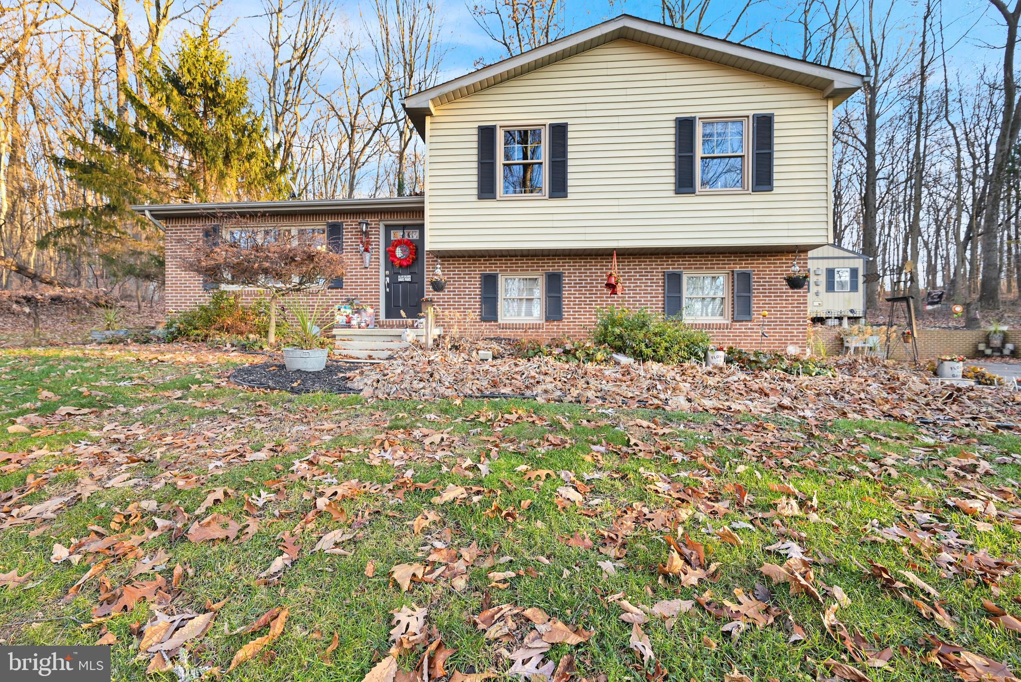 2697 Stoverstown Road Spring Grove, PA 17362 - Photo 1 of 38 a front view of a house with garden