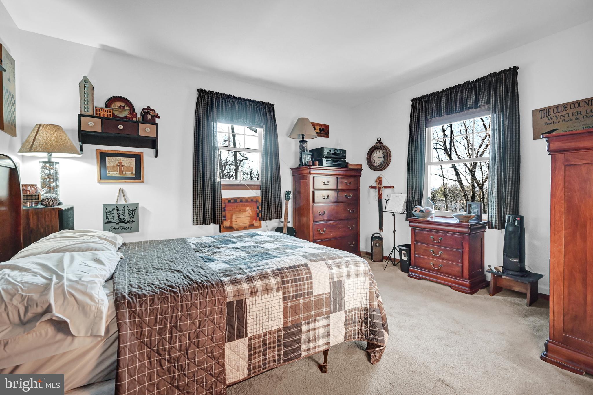 2697 Stoverstown Road Spring Grove, PA 17362 - Photo 12 of 38 a bed room with a bed and a dresser