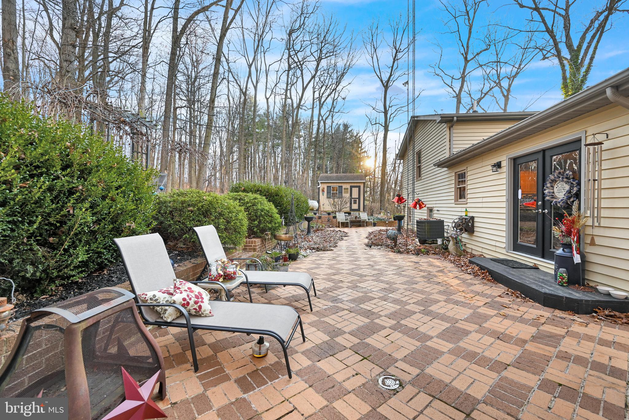 2697 Stoverstown Road Spring Grove, PA 17362 - Photo 18 of 38 a view of a patio with table and chairs and potted plants