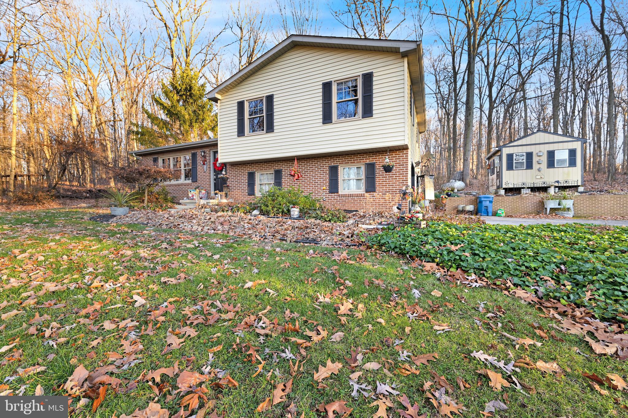 2697 Stoverstown Road Spring Grove, PA 17362 - Photo 22 of 38 a front view of a house with a yard