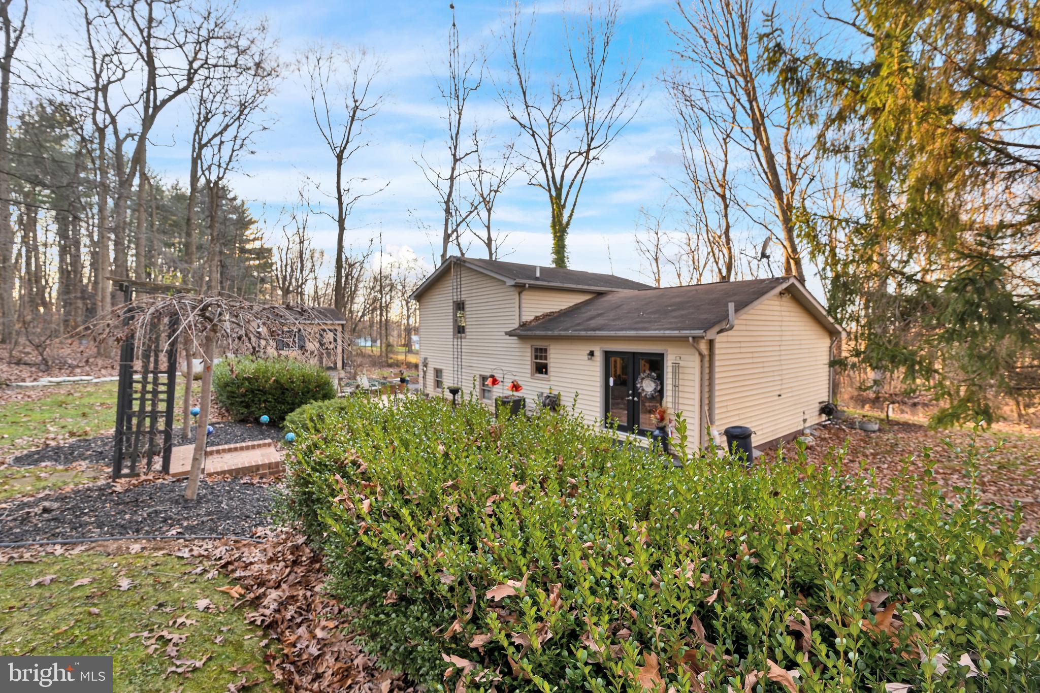 2697 Stoverstown Road Spring Grove, PA 17362 - Photo 23 of 38 a front view of a house with garden